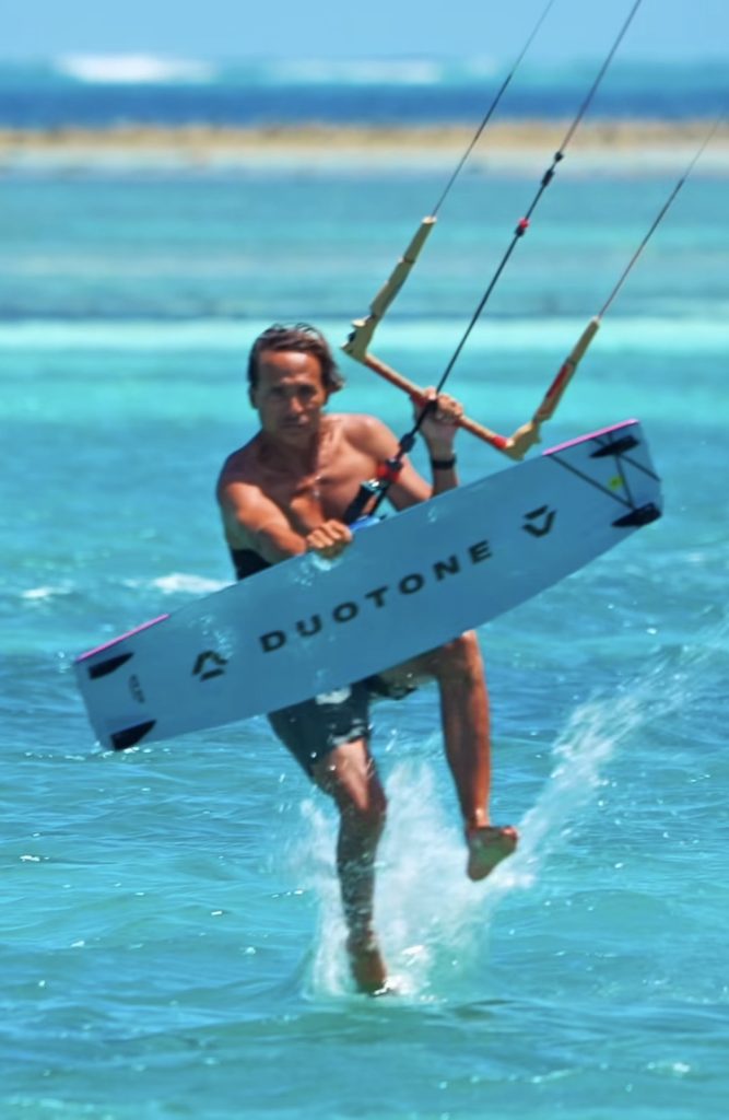 Jeremie Tronet performing the Jesus Walk kitesurfing trick