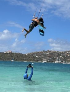 Water-level camera production with Jeremie kitesurfing overhead
